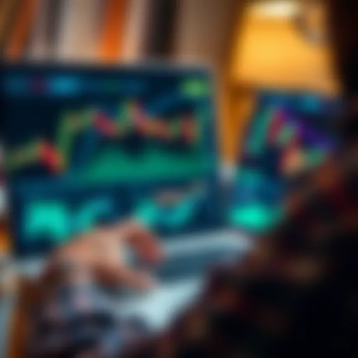 Close-up of a person analyzing financial data and forex charts on a laptop