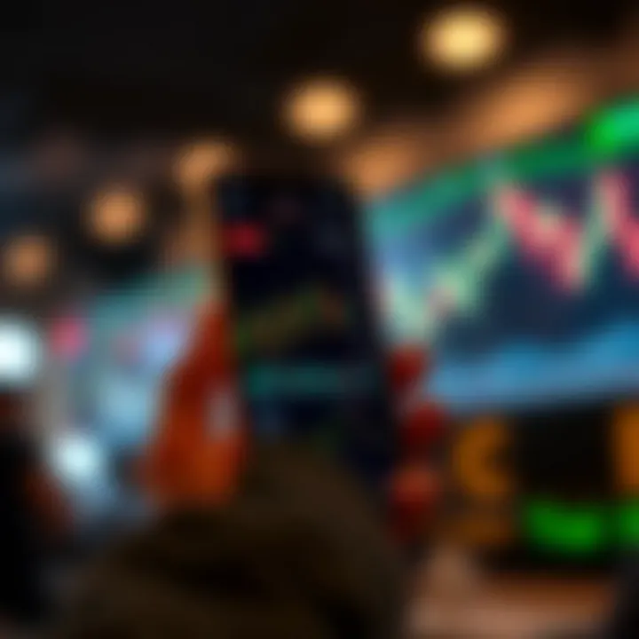 Mobile device displaying a forex trading application interface with charts and currency pairs